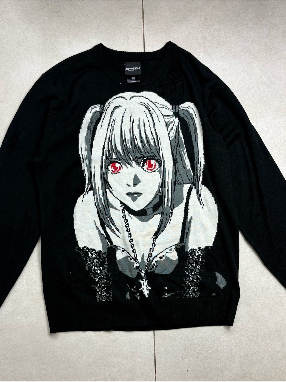 Black Anime Graphic Knit Sweater with Red Accent Eyes